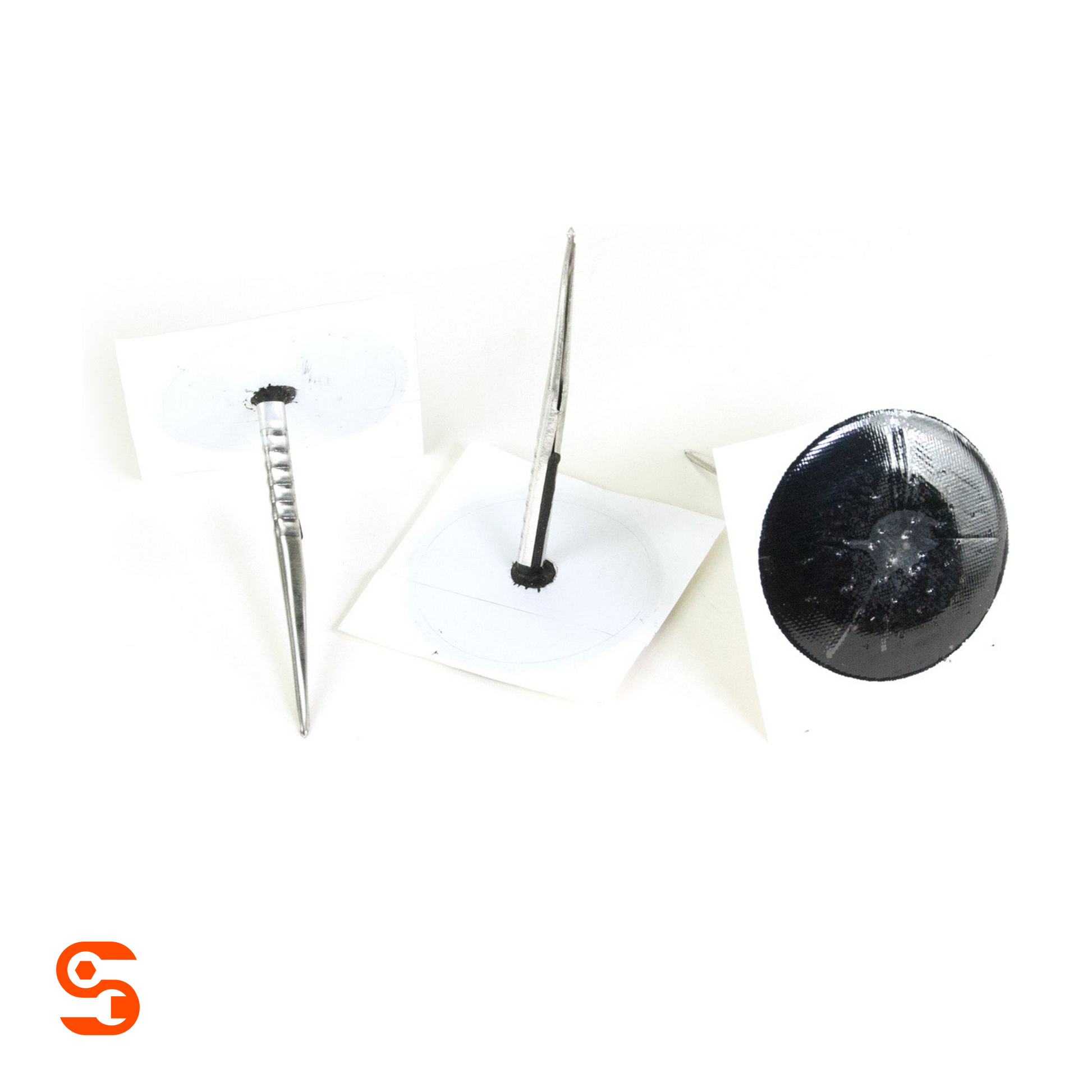 Three Xtra Seal combination patch repair units with silver stems and round black and white patch bases