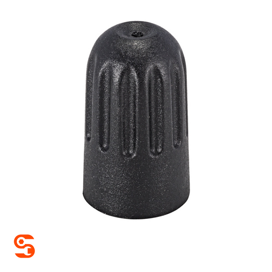 Black Schrader TPMS valve cap with textured finish, ribbed sides, and domed top with center hole