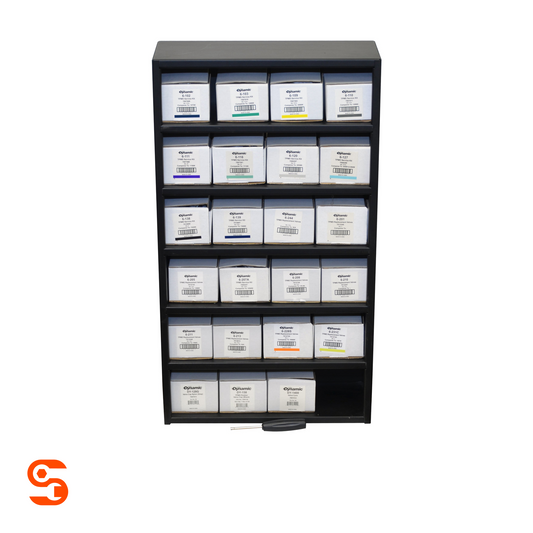 Black wall cabinet holding multiple labeled white TPMS valve and service kit boxes with a tool in front