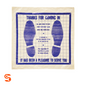 Clear disposable plastic floor mat with blue printed footprint design and service message, roll of 500