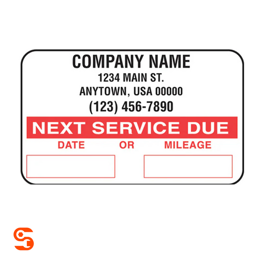 White and red vehicle next service due reminder sticker with date and mileage boxes